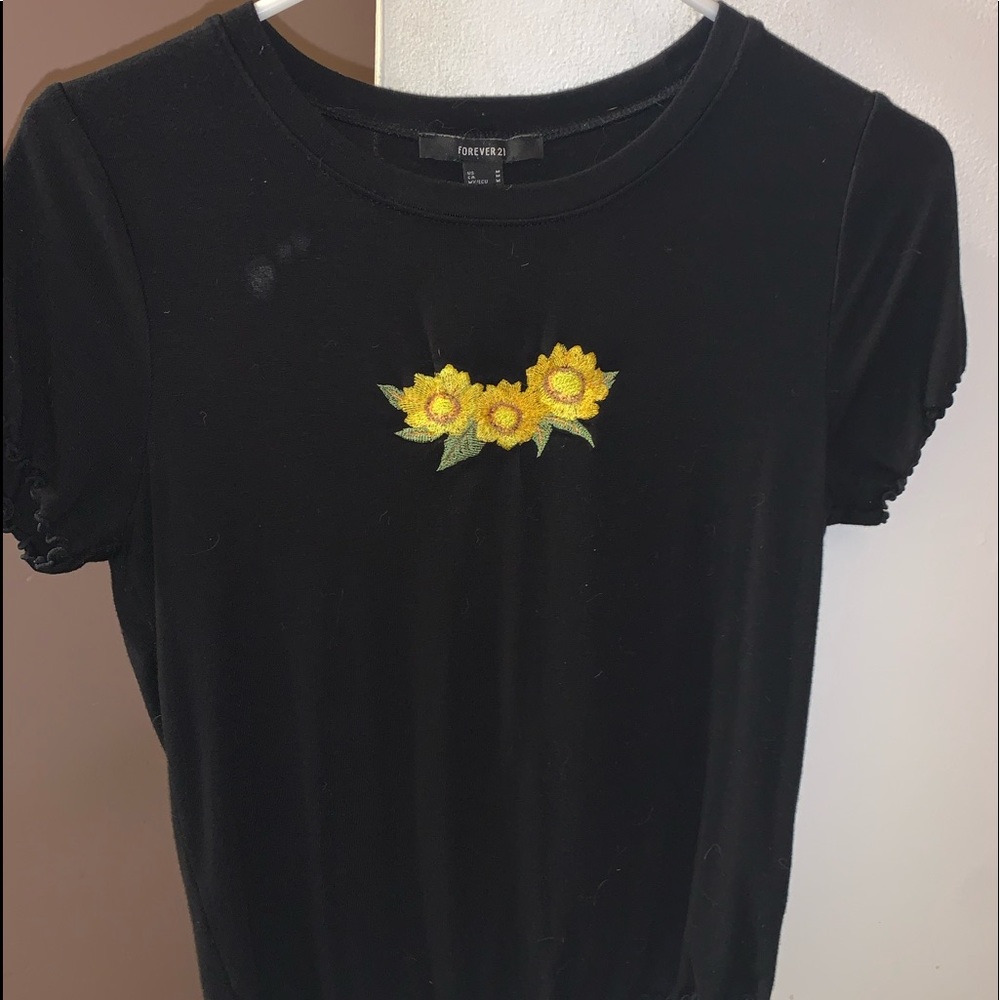 Black shirt w sunflowers